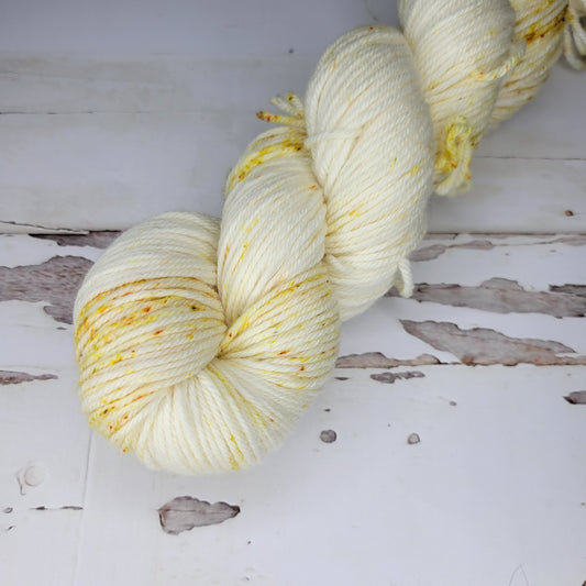 Shimmer: Hand Dyed Speckled Yarn in Gold Tones